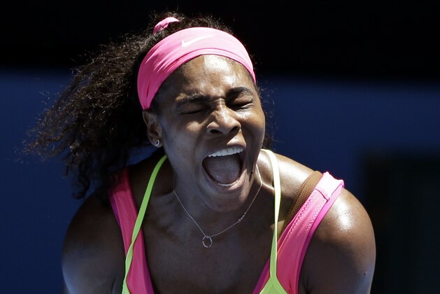 Serena Williams of the U.S. celebrates a point won against Elina Svitolina of Ukraine in their third round match at the Australian Open tennis championship in Melbourne, Australia, Saturday, Jan. 24, 2015. (AP Photo/Lee Jin-man)