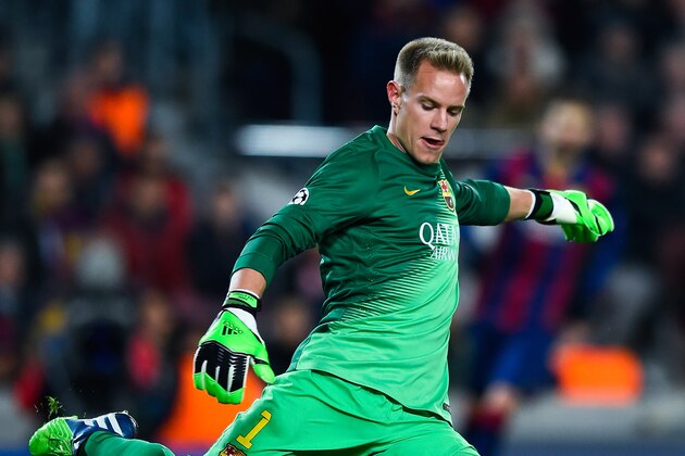 BARCELONA, SPAIN - DECEMBER 10:  Marc-Andre Ter Stegen of FC Barcelona controls the ball during the UEFA Champions League group F match between FC Barcelona and Paris Saint-Germanin FC at Camp Nou Stadium on December 10, 2014 in Barcelona, Spain.  (Photo by David Ramos/Getty Images)
