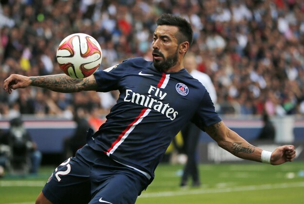 Paris Saint Germain's Argentinian Ezequiel Lavezzi, controls the ball, during a French League One soccer Match, Paris Saint Germain against Bastia, at Parc des Princes stadium, in Paris, Saturday, Aug. 16. 2014. Paris Saint Germain won 2-0. (AP Photo/Michel Euler)
