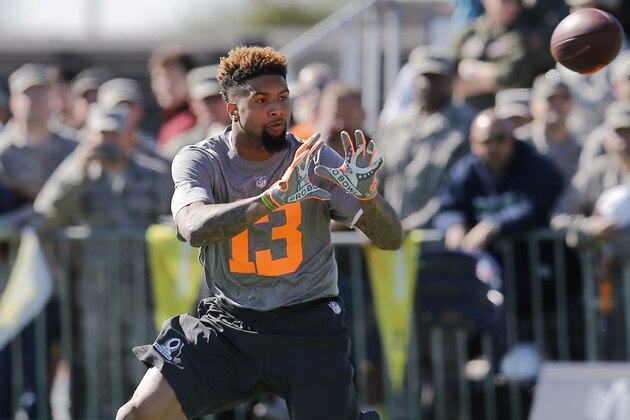 IMAGE DISTRIBUTED FOR USAA - NFL Pro Bowler Odell Beckham Jr. catches a pass during an NFL Pro Bowl practice at Luke Air Force Base sponsored by USAA, the Official Military Sponsor of the NFL, on Thursday, Jan. 22, 2015 in Glendale, Arizona. (Rick Scuteri/AP Images for USAA)