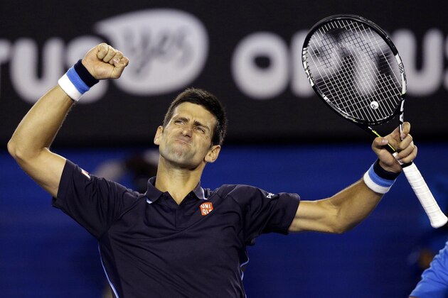 Novak Djokovic of Serbia celebrates after defeating  Fernando Verdasco of Spain in their third round match at the Australian Open tennis championship in Melbourne, Australia, Saturday, Jan. 24, 2015. (AP Photo/Lee Jin-man)