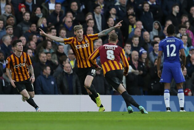 Bradford’s Jon Stead, second left, celebrates after scoring a goal during the English FA Cup 4th round soccer match between Bradford City and Chelsea at Stamford Bridge, London, England, Saturday, Jan. 24, 2015. (AP Photo/Tim Ireland)
