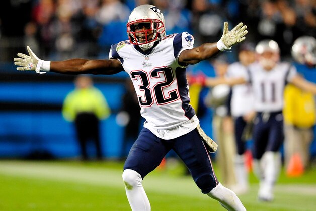 CHARLOTTE, NC - NOVEMBER 18:  Devin McCourty #32 of the New England Patriots reacts after being called for defensive holding late in the fourth qurter of a loss to the Carolina Panthers at Bank of America Stadium on November 18, 2013 in Charlotte, North Carolina. The Panthers won 24-20.  (Photo by Grant Halverson/Getty Images)
