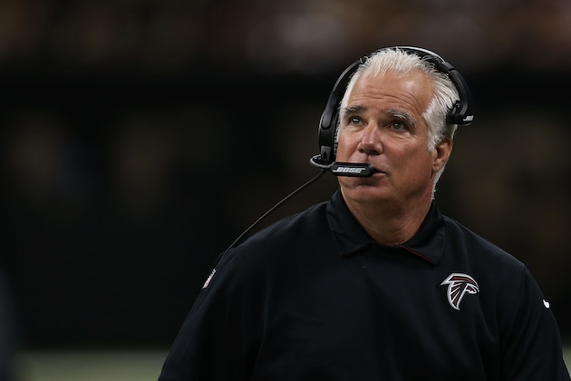 NEW ORLEANS, LA - DECEMBER 21:  Head coach Mike Smith of the Atlanta Falcons watches action during the second quarter of game against the New Orleans Saints at the Mercedes-Benz Superdome on December 21, 2014 in New Orleans, Louisiana.  (Photo by Chris Graythen/Getty Images)