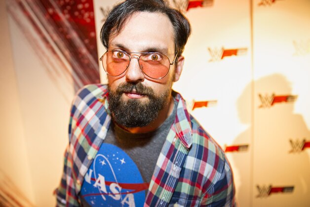 IMAGE DISTRIBUTED FOR 2K - WWE Superstar Damien Sandow, dressed as a stereotypical gamer, at the WWE 2K15 Press Event at Cicada Restaurant, on Saturday, August 16, 2014 in Los Angeles. (Photo by Colin Young-Wolff/Invision for 2K/AP Images)