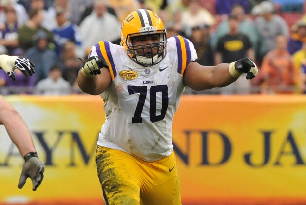 TAMPA, FL -  JANUARY 1:  Tackle Lael Collins #70 of the LSU Tigers sets for play against the Iowa Hawkeyes January 1, 2014  in the Outback Bowl at Raymond James Stadium in Tampa, Florida.  LSU won 21 - 14. (Photo by Al Messerschmidt/Getty Images)