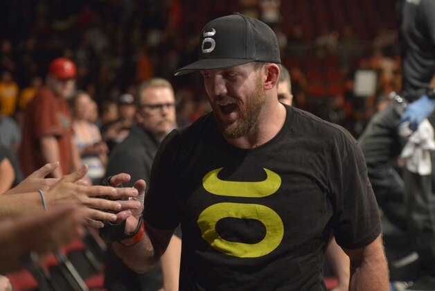 Aug 16, 2014; Bangor, ME, USA; Ryan Bader (red gloves) leaves the octagon after defeating Ovince Saint Preux (blue gloves not pictured) during light heavyweight bout at Cross Insurance Center. Mandatory Credit: Gregory J. Fisher-USA TODAY Sports Aug 16, 2014; Bangor, ME, USA; Ryan Bader (red gloves) leaves the octagon after defeating Ovince Saint Preux (blue gloves not pictured) during light heavyweight bout at Cross Insurance Center. Mandatory Credit: Gregory J. Fisher-USA TODAY Sports