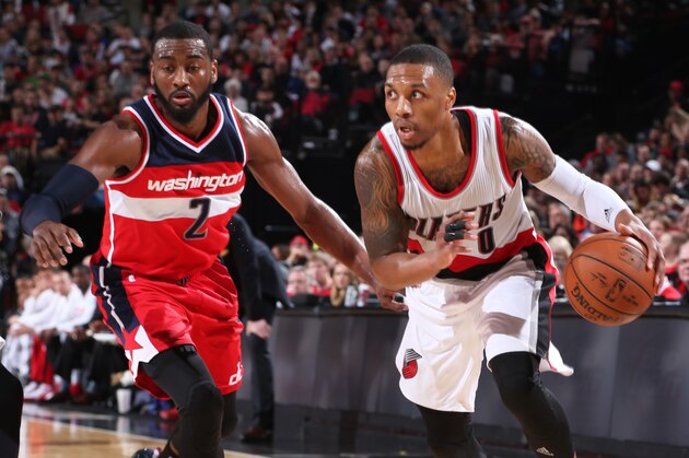 PORTLAND, OR - JANUARY 24: Damian Lillard #0 of the Portland Trail Blazers handles the ball against the Washington Wizards on January 24, 2015 at the Moda Center in Portland, Oregon. NOTE TO USER: User expressly acknowledges and agrees that, by downloading and or using this Photograph, user is consenting to the terms and conditions of the Getty Images License Agreement. Mandatory Copyright Notice: Copyright 2015 NBAE (Photo by Sam Forencich/NBAE via Getty Images) PORTLAND, OR - JANUARY 24: Damian Lillard #0 of the Portland Trail Blazers handles the ball against the Washington Wizards on January 24, 2015 at the Moda Center in Portland, Oregon. NOTE TO USER: User expressly acknowledges and agrees that, by downloading and or using this Photograph, user is consenting to the terms and conditions of the Getty Images License Agreement. Mandatory Copyright Notice: Copyright 2015 NBAE (Photo by Sam Forencich/NBAE via Getty Images)