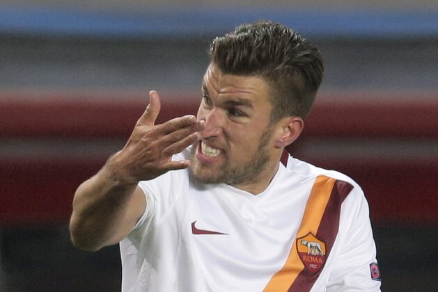 Roma's Kevin Strootman of The Netherlands gestures during the Champions League Group E  soccer match between CSKA Moscow and A.S. Roma at Arena Khimki stadium in Moscow, Russia, Tuesday, Nov. 25, 2014. Roma conceded a goal in the last minutes of the match ending the game in a 1-1 draw. (AP Photo/Ivan Sekretarev)