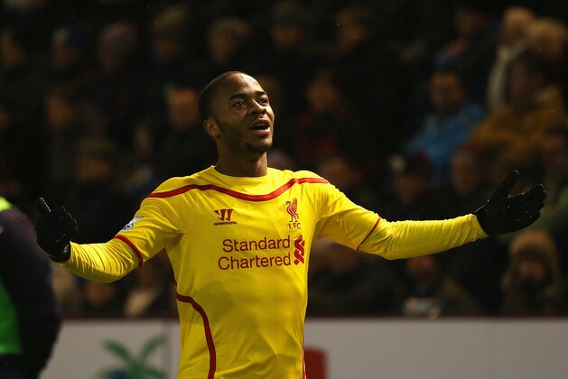 BURNLEY, ENGLAND - DECEMBER 26:  Raheem Sterling of Liverpool celebrates scoring the opening goal during the Barclays Premier League match between Burnley and Liverpool at Turf Moor on December 26, 2014 in Burnley, England.  (Photo by Bryn Lennon/Getty Images)