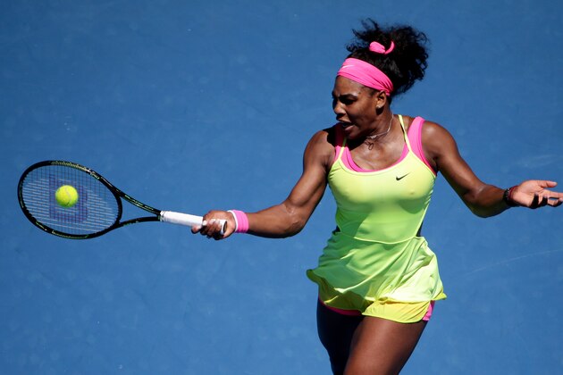 Serena Williams of the U.S. makes a forehand return to Elina Svitolina of Ukraine during their third round match at the Australian Open tennis championship in Melbourne, Australia, Saturday, Jan. 24, 2015. (AP Photo/Rob Griffith)