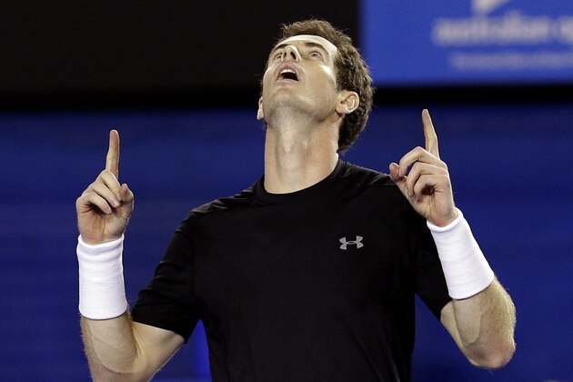 Andy Murray of Britain celebrates after defeating Grigor Dimitrov of Bulgaria in their fourth round match at the Australian Open tennis championship in Melbourne, Australia, early Monday, Jan. 26, 2015. (AP Photo/Bernat Armangue)