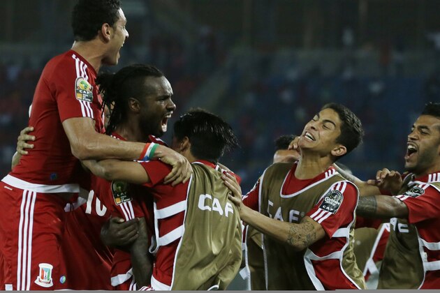 Equatorial Guinea's Javier Balboa, second from left, celebrates with teammates after scoring a goal during their African Cup of Nations Group A soccer match against Gabon in Bata, Equatorial Guinea, Sunday, Jan. 25, 2015. (AP Photo/Themba Hadebe)