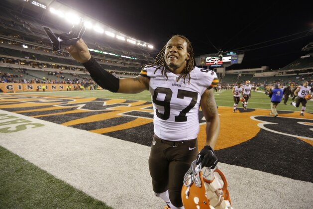 Cleveland Browns outside linebacker Jabaal Sheard celebrates after a 24-3 win over the Cincinnati Bengals in an NFL football game Thursday, Nov. 6, 2014, in Cincinnati. (AP Photo/Michael Conroy)