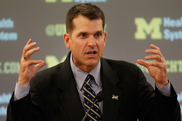 ANN ARBOR, MI - DECEMBER 30:  Jim Harbaugh speaks as he is introduced as the new Head Coach of the University of Michigan football team at the Junge Family Champions Center on December 30, 2014 in Ann Arbor, Michigan.  (Photo by Gregory Shamus/Getty Images)