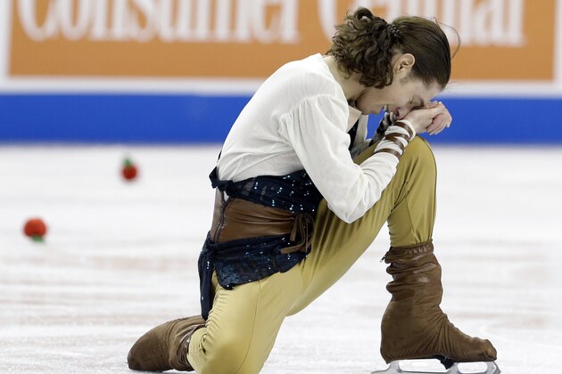 Jason Brown reacts following his performance in the men's free skate competition in the U.S. Figure Skating Championships in Greensboro, N.C., Sunday, Jan. 25, 2015. Brown won his first U.S. title, holding off Adam Rippon thanks to his big lead after the short program. (AP Photo/Gerry Broome)