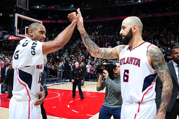ATLANTA, GA - JANUARY 23: Al Horford #15 of the Atlanta Hawks celebrates with Pero Antic #6 after the game against the Oklahoma City Thunder on January 23, 2015 at Philips Arena in Atlanta, Georgia.  NOTE TO USER: User expressly acknowledges and agrees that, by downloading and/or using this Photograph, user is consenting to the terms and conditions of the Getty Images License Agreement. Mandatory Copyright Notice: Copyright 2015 NBAE (Photo by Scott Cunningham/NBAE via Getty Images)