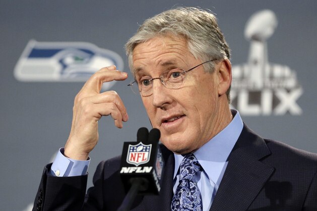 Seattle Seahawks head coach Pete Carroll answers a question at a news conference for NFL Super Bowl XLIX football game Sunday, Jan. 25, 2015, in Phoenix. The Seahawks play the New England Patriots in Super Bowl XLIX on Sunday, Feb. 1, 2015. (AP Photo/David J. Phillip)