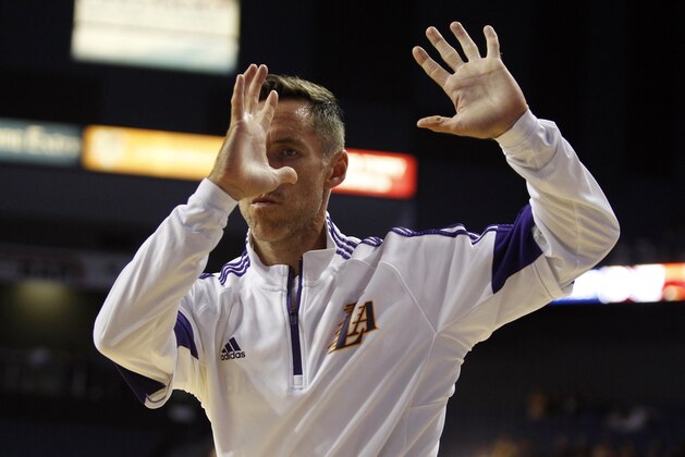 Los Angeles Lakers guard Steve Nash stretches out during warmups for a preseason NBA basketball game against the Golden State Warriors, Sunday, Oct. 12, 2014, in Ontario, Calif. (AP Photo/Alex Gallardo) Los Angeles Lakers guard Steve Nash stretches out during warmups for a preseason NBA basketball game against the Golden State Warriors, Sunday, Oct. 12, 2014, in Ontario, Calif. (AP Photo/Alex Gallardo)