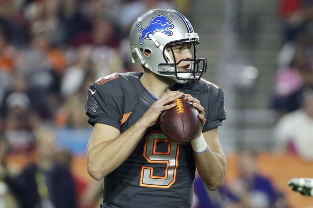 Detroit Lions' Matthew Stafford drops back to pass during the first half of the NFL Football Pro Bowl Sunday, Jan. 25, 2015, in Glendale, Ariz. (AP Photo/Mark Humphrey)