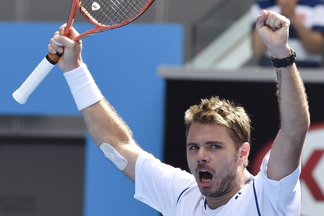 Stan Wawrinka of Switzerland celebrates after defeating Guillermo Garcia-Lopez of Spain in their fourth round match at the Australian Open tennis championship in Melbourne, Australia, Monday, Jan. 26, 2015. (AP Photo/Andy Brownbill)