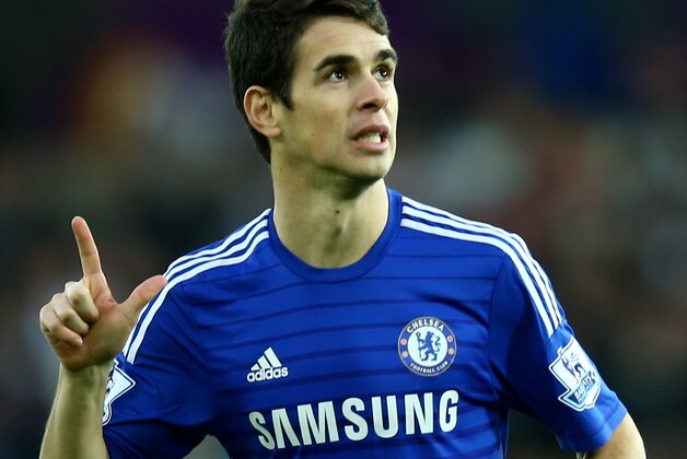 SWANSEA, WALES - JANUARY 17:  Oscar of Chelsea celebrates after scoring his team's first goal during the Barclays Premier League match between Swansea City and Chelsea at Liberty Stadium on January 17, 2015 in Swansea, Wales.  (Photo by Richard Heathcote/Getty Images)