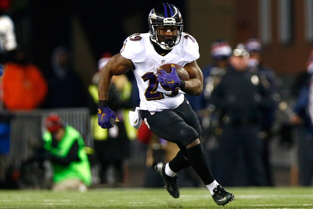FOXBORO, MA - JANUARY 10:  Justin Forsett #29 of the Baltimore Ravens runs with the ball in the second quarter against the New England Patriots during the 2014 AFC Divisional Playoffs game at Gillette Stadium on January 10, 2015 in Foxboro, Massachusetts.  (Photo by Jared Wickerham/Getty Images)