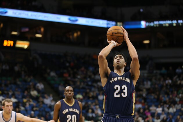 MINNEAPOLIS, MN - JANUARY 23:  Anthony Davis #23 of the New Orleans Pelicans shoots a free throw against the Minnesota Timberwolves during the game on January 23, 2015 at Target Center in Minneapolis, Minnesota. NOTE TO USER: User expressly acknowledges and agrees that, by downloading and or using this Photograph, user is consenting to the terms and conditions of the Getty Images License Agreement. Mandatory Copyright Notice: Copyright 2015 NBAE (Photo by Jordan Johnson/NBAE via Getty Images)