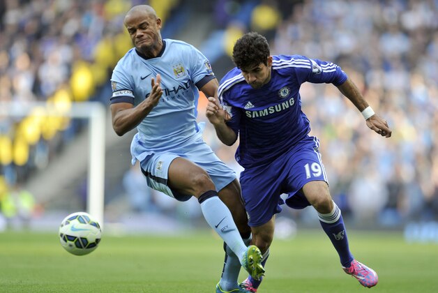 Manchester City's Vincent Kompany left, and Chelsea's Diego Costa battle for the ball during their English Premier League soccer match at the Etihad Stadium in Manchester, England, Sunday Sept. 21, 2014. (AP Photo/Clint Hughes) Manchester City's Vincent Kompany left, and Chelsea's Diego Costa battle for the ball during their English Premier League soccer match at the Etihad Stadium in Manchester, England, Sunday Sept. 21, 2014. (AP Photo/Clint Hughes)