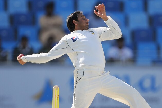 DUBAI, UNITED ARAB EMIRATES - JANUARY 19:  Saeed Ajmal of Pakistan bowls during the first Test match between Pakistan and England at The Dubai International Cricket Stadium on January 19, 2012 in Dubai, United Arab Emirates.  (Photo by Gareth Copley/Getty Images)