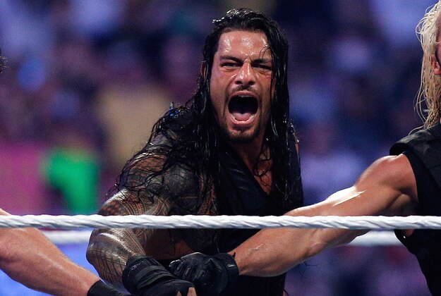The Shield reacts after their win during Wrestlemania XXX at the Mercedes-Benz Super Dome in New Orleans on Sunday, April 6, 2014. (Jonathan Bachman/AP Images for WWE)