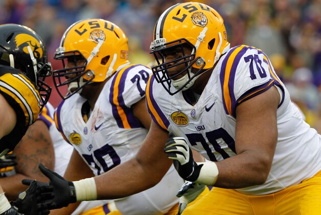 Jan 1, 2014; Tampa, Fl, USA; LSU Tigers offensive tackle La'el Collins (70) blocks against theIowa Hawkeyes during the first half at Raymond James Stadium. Mandatory Credit: Kim Klement-USA TODAY Sports