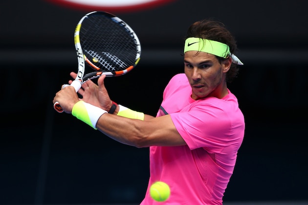 MELBOURNE, AUSTRALIA - JANUARY 25:  Rafael Nadal of Spain plays a backhand in his fourth round match against Kevin Anderson of South Africa during day seven of the 2015 Australian Open at Melbourne Park on January 25, 2015 in Melbourne, Australia.  (Photo by Clive Brunskill/Getty Images)