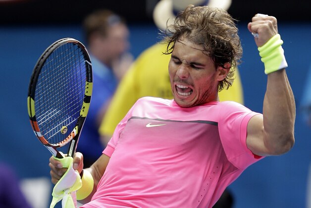 Rafael Nadal of Spain celebrates after defeating Kevin Anderson of South Africa in  their fourth round match at the Australian Open tennis championship in Melbourne, Australia, Sunday, Jan. 25, 2015. (AP Photo/Bernat Armangue)