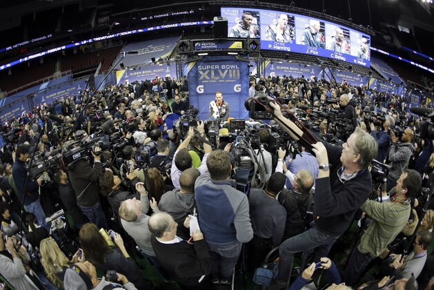 10ThingstoSeeSports - Denver Broncos' Peyton Manning answers questions during media day for the NFL Super Bowl XLVIII football game Tuesday, Jan. 28, 2014, in Newark, N.J. (AP Photo/Jeff Roberson, File)