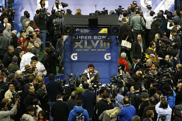 NEWARK, NJ - JANUARY 28:  Quarterback Russell Wilson #3 of the Seattle Seahawks speaks to the media during Super Bowl XLVIII Media Day at the Prudential Center on January 28, 2014 in Newark, New Jersey.  Super Bowl XLVIII will be played between the Seattle Seahawks and the Denver Broncos on February 2.  (Photo by Jeff Zelevansky/Getty Images)