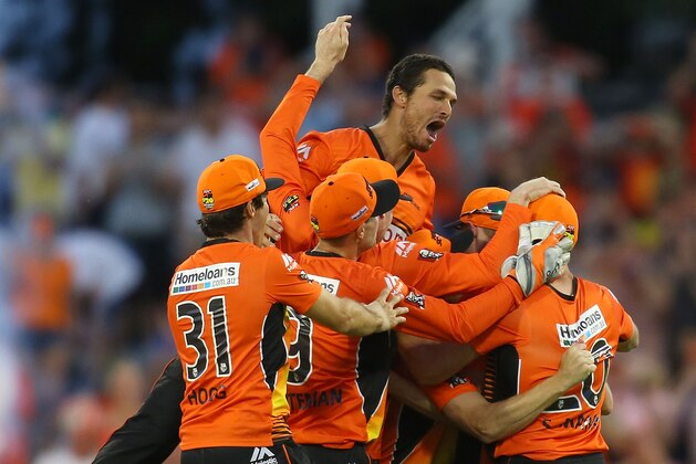 PERTH, AUSTRALIA - JANUARY 25: The Scorchers celebrate after defeating the Stars during the Big Bash League Semi Final match between the Perth Scorchers and the Melbourne Stars at WACA on January 25, 2015 in Perth, Australia.  (Photo by Paul Kane/Getty Images)