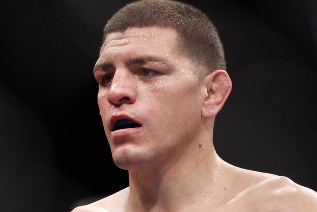 Carlos Condit, left, and Nick Diaz stare each other down as referee Steve Mazzagatti separates them at the end of the third round during their UFC interim welterweight mixed martial arts title match, Saturday, Feb. 4, 2012 at The Mandalay Bay Resort & Casino in Las Vegas. Condit won by unanimous decision. (AP Photo/Eric Jamison) Carlos Condit, left, and Nick Diaz stare each other down as referee Steve Mazzagatti separates them at the end of the third round during their UFC interim welterweight mixed martial arts title match, Saturday, Feb. 4, 2012 at The Mandalay Bay Resort & Casino in Las Vegas. Condit won by unanimous decision. (AP Photo/Eric Jamison)