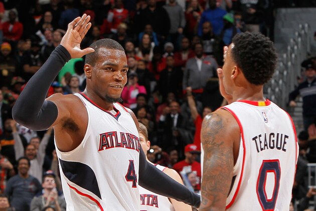 ATLANTA, GA - JANUARY 23:  Paul Millsap #4 of the Atlanta Hawks congratulates Jeff Teague #0 after his steal and dunk against the Oklahoma City Thunder at Philips Arena on January 23, 2015 in Atlanta, Georgia.  NOTE TO USER: User expressly acknowledges and agrees that, by downloading and or using this photograph, User is consenting to the terms and conditions of the Getty Images License Agreement.  (Photo by Kevin C. Cox/Getty Images)