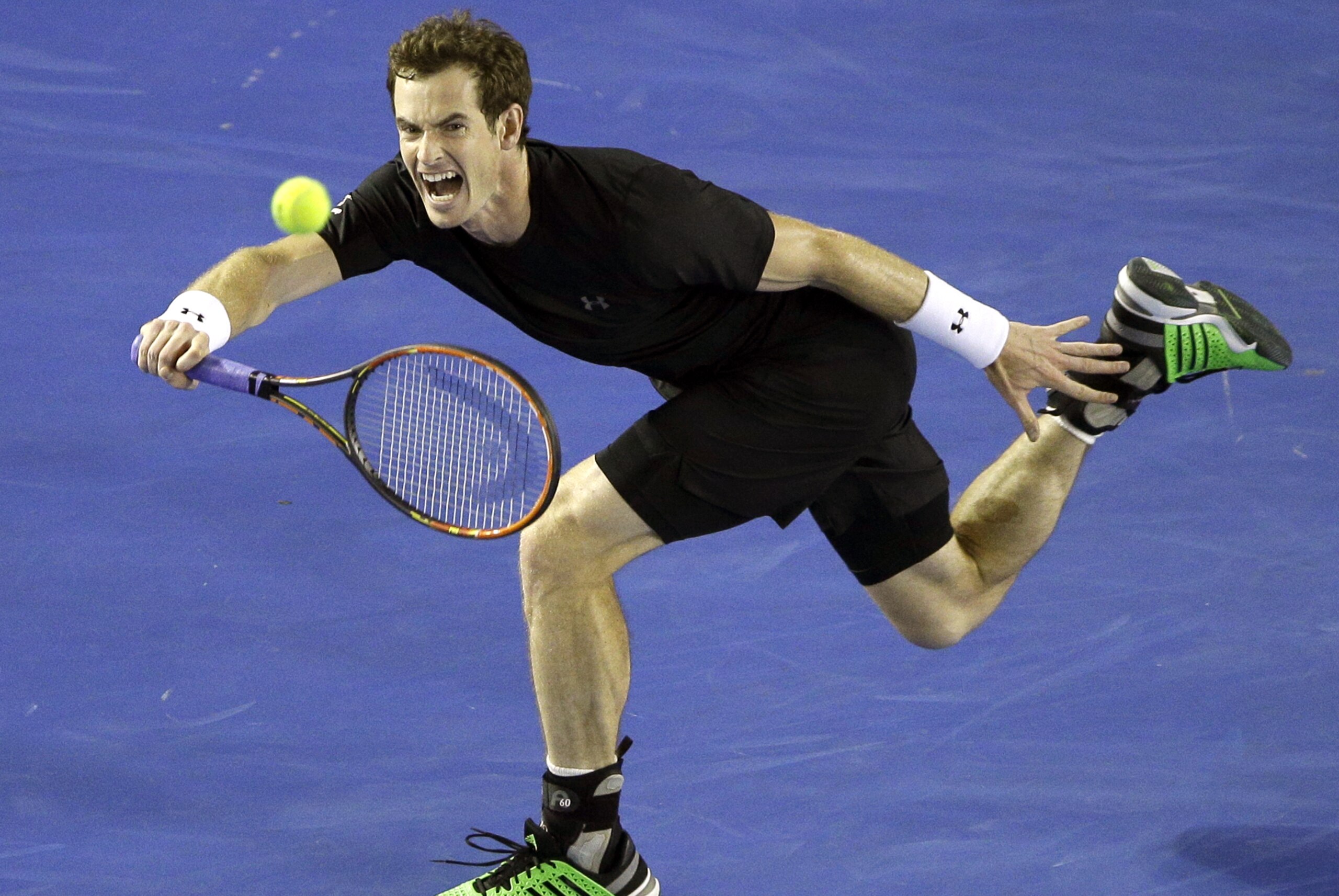Andy Murray of Britain reaches out for a shot to Grigor Dimitrov of Bulgaria during their fourth round match at the Australian Open tennis championship in Melbourne, Australia, Sunday, Jan. 25, 2015. (AP Photo/Lee Jin-man) Andy Murray of Britain reaches out for a shot to Grigor Dimitrov of Bulgaria during their fourth round match at the Australian Open tennis championship in Melbourne, Australia, Sunday, Jan. 25, 2015. (AP Photo/Lee Jin-man)