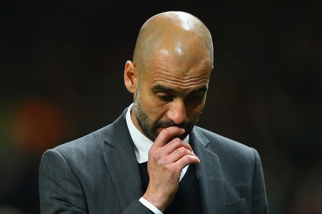 MANCHESTER, ENGLAND - APRIL 01:  Pep Guardiola head coach of Bayern Muenchen at the end of match during the UEFA Champions League Quarter Final first leg match between Manchester United and FC Bayern Muenchen at Old Trafford on April 1, 2014 in Manchester, England.  (Photo by Alex Livesey/Getty Images)