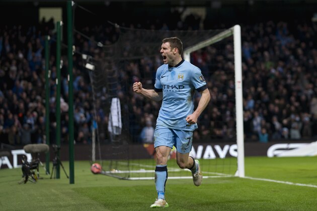 Manchester City's James Milner celebrates after scoring against Sheffield Wednesday during their English FA Cup third round soccer match at the Etihad Stadium, Manchester, England, Sunday, Jan. 4, 2015. (AP Photo/Jon Super)