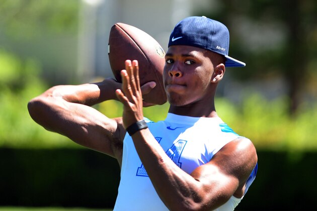Jul 10, 2014; Beaverton, OR, USA; Land Shark quarterback Deondre Francois (14) passes the ball as he warms up during Nike Football ' The Opening' at Nike World Headquarters.  Mandatory Credit: Steve Dykes-USA TODAY Sports
