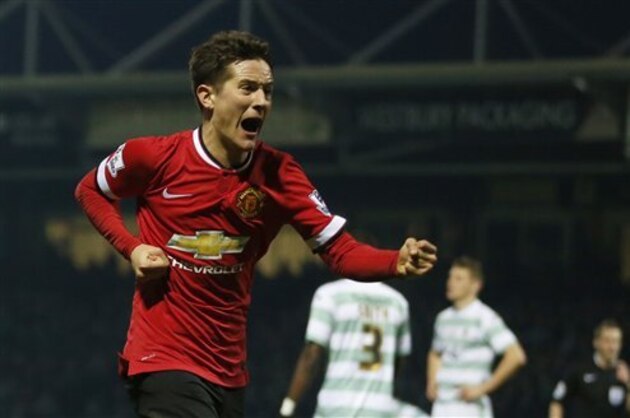 Manchester United’s Ander Herrera celebrates after scoring the opening goal during their English FA Cup third round soccer match between Yeovil Town and Manchester United at Huish Park stadium in Yeovil, England, Sunday, Jan.  4, 2015 . (AP Photo/Alastair Grant)