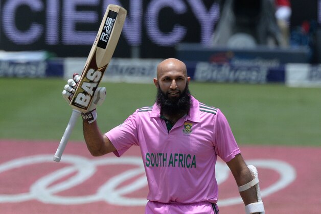 JOHANNESBURG, SOUTH AFRICA - JANUARY 18: Hashim Amla of South Africa celebrates his century during the 2nd Momentum ODI between South Africa and West Indies at Bidvest Wanderers Stadium on January 18, 2015 in Johannesburg, South Africa. (Photo by Duif du Toit/Gallo Images/Getty Images)