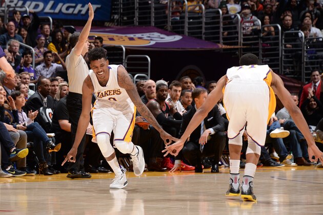 LOS ANGELES, CA - JANUARY 11:  Nick Young #0 of the Los Angeles Lakers celebrates during the game against the Portland Trail Blazers on January 11, 2015 at STAPLES Center in Los Angeles, California. NOTE TO USER: User expressly acknowledges and agrees that, by downloading and/or using this Photograph, user is consenting to the terms and conditions of the Getty Images License Agreement. Mandatory Copyright Notice: Copyright 2015 NBAE (Photo by Andrew D. Bernstein/NBAE via Getty Images)