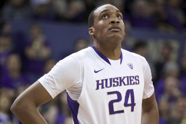 Washington's Robert Upshaw watches a free throw during the first half of an NCAA college basketball game against Stony Brook Sunday, Dec. 28, 2014, in Seattle. Stony Brook won 62-57. (AP Photo/Stephen Brashear)