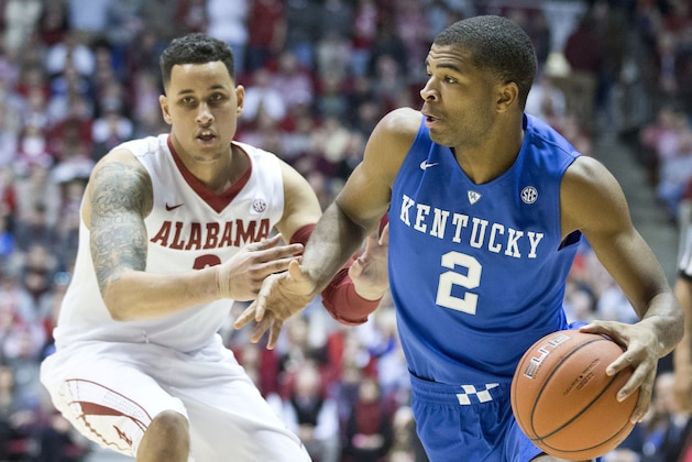 Kentucky guard Aaron Harrison (2) drives the ball towards the basket against Alabama forward Michael Kessens (3) during the first half of an NCAA college basketball game, Saturday, Jan. 17, 2015, in Tuscaloosa, Ala. (AP Photo/Brynn Anderson)
