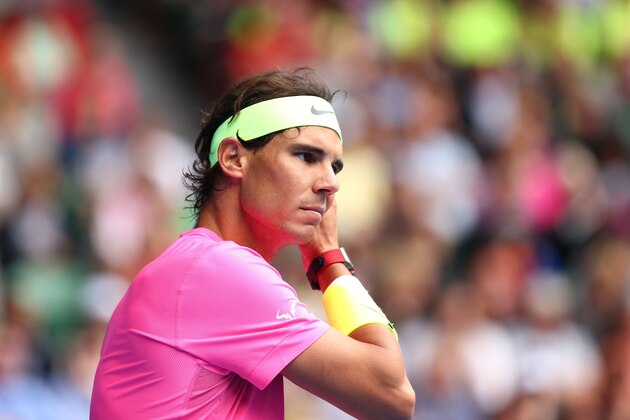 MELBOURNE, AUSTRALIA - JANUARY 27:  Rafael Nadal of Spain looks on in his quarterfinal match against Tomas Berdych of the Czech Republic during day nine of the 2015 Australian Open at Melbourne Park on January 27, 2015 in Melbourne, Australia.  (Photo by Cameron Spencer/Getty Images)