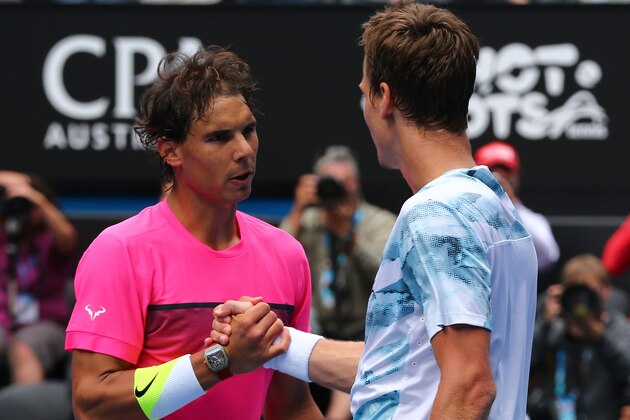 MELBOURNE, AUSTRALIA - JANUARY 27:  Rafael Nadal of Spain and Tomas Berdych of the Czech Republic at the net after Berdych won in their quarterfinal match during day nine of the 2015 Australian Open at Melbourne Park on January 27, 2015 in Melbourne, Australia.  (Photo by Clive Brunskill/Getty Images)